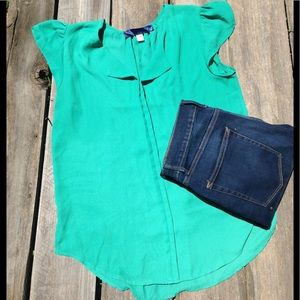 Francesca's green blouse